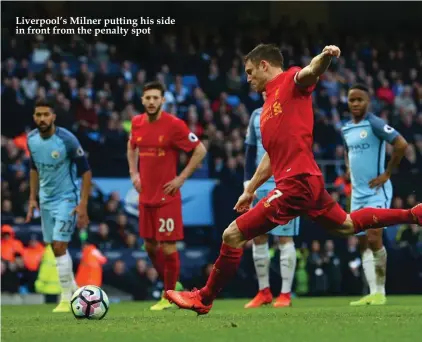  ??  ?? Liverpool’s Milner putting his side in front from the penalty spot