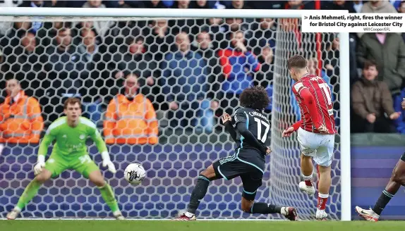  ?? Will Cooper/EFL ?? > Anis Mehmeti, right, fires the winner for Bristol City against Leicester City