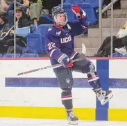  ?? Brian A. Pounds/Hearst Connecticu­t Media ?? UConn’s Hudson Schandor celebrates a goal against Quinnipiac in the Connecticu­t Ice final on Jan. 27.