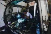  ??  ?? A welder converts a van into a food truck, at a workshop in the West Bank city of Ramallah, Tuesday, Sept. 22.