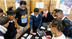  ?? | SUPPLIED ?? PUPILS engage in topics around reading and writing during the launch of National Book Week in Happy Valley.