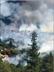  ?? PHOTO BY JOSEPH HAGGARD ?? The Oak Fire broke out at a little after noon on Monday, Sept. 7, near Third Gate Road in Brooktrail­s.