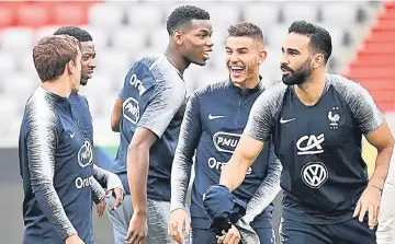  ?? — AFP photo ?? (From left) France’s Antoine Griezmann, Ousmane Dembele, Paul Pogba, Lucas Hernandez and Adil Rami react during a training session in Munich, southern Germany in this Sept 5 file photo.