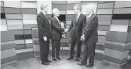  ?? ADRIAN WYLD/The Canadian Press ?? From left: Prime Minister Stephen Harper, NDP Leader Jack Layton, Liberal Leader Michael Ignatieff and Bloc Quebecois Leader Gilles Duceppe exchange handshakes before the English language federal election debate in April 2011.