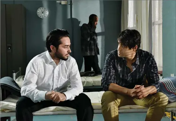  ?? JANUS FILMS ?? Simon Al-Bazoon and Sherwan Haji in “The Other Side of Hope.”