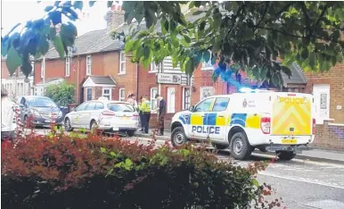  ??  ?? Police at the scene in Hythe Road, where a girl was injured