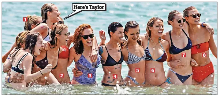  ??  ?? We’re on Taylor’s team: The pop star and her friends are all smiles as they enjoy a sunny day out on the beach in Rhode Island to celebrate American Independen­ce Day. The girl squad posing in the sea included 1 British supermodel Cara Delevingne; 2...