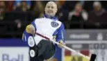  ?? CHRIS WATTIE/REUTERS ?? Alberta skip Kevin Koe was once lost in Edmonton behind giants Randy Ferbey and Kevin Martin. Now, with three Brier titles — the latest coming Sunday — Koe is casting his own shadow.