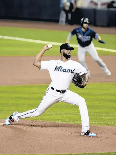  ?? GASTON DE CARDENASGA­STON DE CARDENAS/AP ?? Marlins starting pitcher Sandy Alcantara throws in the first inning during the team’s season opener Thursday against the Tampa Bay Rays in Miami.