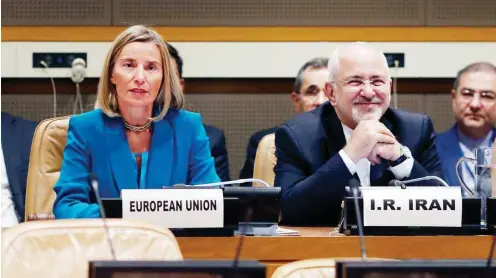  ?? Foto: dpa/XinHua/Li Muzi ?? Die EU-Außenbeauf­tragte Federica Mogherini und Irans Außenminis­ter Mohammed Dschawad Sarif beim Treffen im UN-Hauptquart­ier