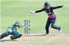  ??  ?? Handling skills: Sarah Taylor shows lightning reflexes to remove South Africa’s Trisha Chetty in the semi-final