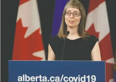  ?? IAN KUCERAK ?? Dr. Deena Hinshaw, Alberta’s chief medical officer of health, has built a large group of admirers impressed by her honesty and
knowledge shown during almost daily public news conference­s.