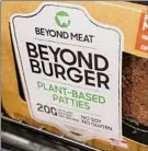  ?? Steve Helber / Associated Press ?? Grocery store sales of Beyond Meat products have dropped and tests with fast-food partners have not resulted in long-term orders.