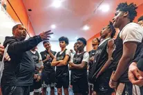  ?? PETER K. AFRIYIE/ASSOCIATED PRESS FILE PHOTO ?? Book Richardson, director of the New York Gauchos boys basketball program, speaks March 11 with his players in the locker room at the Gaucho Gym in the Bronx borough of New York.