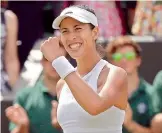  ?? AP ?? Garbine Muguruza celebrates her win.