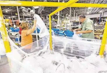  ?? Craig H. Hartley ?? Igloo puts 98 percent of its leftover plastic back into creating new coolers at its plant in Katy. It sells the other 2 percent, along with other materials, to Avangard Innovative.