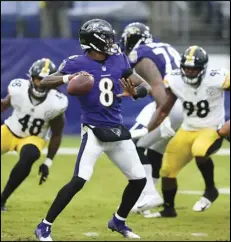  ?? Associated Press ?? MOVED — Baltimore Ravens quarterbac­k Lamar Jackson throws during the first half of an NFL game on Nov. 1 in Baltimore.