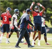  ?? Brett Coomer / Staff photograph­er ?? Texans quarterbac­k Deshaun Watson (4) reacts to a play during training camp at the Greenbrier Sports Performanc­e Center in White Sulphur Springs, W.Va. His mobility at camp is proof he has put an injury behind him.