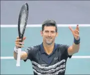  ?? AFP ?? Novak Djokovic celebrates after beating Stefanos Tsitsipas during their quarter-final at the Paris Masters on Friday.