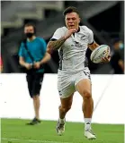  ?? PHOTOSPORT ?? Left: New Zealand’s Kitiona Vai crosses against Scotland. Above: Caleb Tangitau charges ahead.