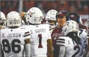  ?? The Associated Press ?? DOG POUND: Mississipp­i State head coach Joe Moorhead talks with players in a timeout a week ago during the second half of a 24-0 loss to the Crimson Tide in Tuscaloosa, Ala.