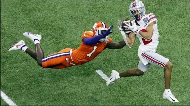  ?? BUTCH DILL — THE ASSOCIATED PRESS FILE ?? Ohio State wide receiver Chris Olave in the 2021 Sugar Bowl.