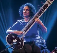  ??  ?? Floating sounds: a sitar player outside a houseboat in Kashmir, India c1900; (right) Anoushka Shankar playing in Mumbai in 2020; (bottom) Ravi Shankar in 2012