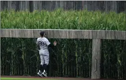  ?? CHARLIE NEIBERGALL — THE ASSOCIATED PRESS ?? Yankees right fielder Aaron Judge watches a home run by the White Sox’s Seby Zavala fly into the outfield corn in the fourth inning on Thursday in Dyersville, Iowa. The White Sox won, 9-8.