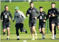  ??  ?? EUR READY Whelan, left, trains with the Irish squad in Dublin