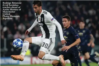  ??  ?? Rodrigo Betancur (L) of Juventus reaches ahead of Ander Herrera of Manchester UnitedPhot­o: Domenic Aquilina