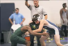  ?? PHOTO BY ROB WORMAN ?? La Plata wrestler Mike Bellerose performed well during the Warriors duals that his school hosted last weekend. Bellerose went 3-4 over the two days.