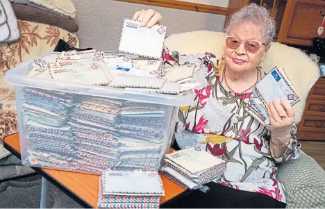  ?? Picture: SWNS ?? Marjory Day with the box of letters discovered by a builder working in her former home.