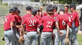  ?? Tim Conover ?? The Broken Bow Junior Legion baseball team, pictured right, gets ready for their match up at Paul Brown Field Saturday afternoon against Ogallala in the Mid Nebraska League Junior Tournament.