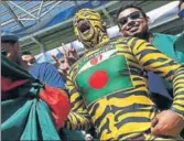  ?? GETTY ?? Shoaib Ali’s journey as Bangladesh super fan in all tiger stripes ■ started the day Sachin Tendulkar scored his 100th century.