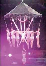  ?? PICTURE: FRANK CAPRIO / AP ?? BEFORE THE FALL: Performers at an aerial hair-hanging stunt at the US’s Ringling Bros and Barnum & Bailey Circus.