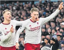  ?? — AFP photo ?? McTominay celebrates scoring the team’s second goal with Hojlund during the English Premier League match between Aston Villa and Manchester United at Villa Park in Birmingham, central England.