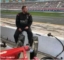  ?? ?? Photo: Matt Kempf
Matt Kempf ready to go to work before the 2021 Coca-cola 600 Charlotte Motor Speedway event. Those large fuel cans are 12-gallons of racing fuel and each weighs in at 100-lbs each.