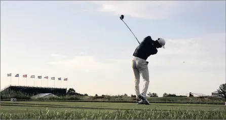  ?? PICTURE: REUTERS ?? SMOOTH SWING: Dustin Johnson tees off the 10th tee box during his practice ahead of the US Open at Erin Hills, Wisconsin.