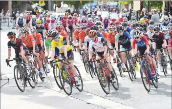  ?? Dan Watson/The Signal ?? Women riders turn onto McBean Parkway at the start of the Amgen Tour of California Women’s Race in Valencia on Saturday.