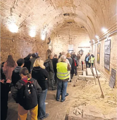  ?? ?? TUNNEL VISION: A queue to see the escape route under the Berlin Wall, made visible to the public yesterday