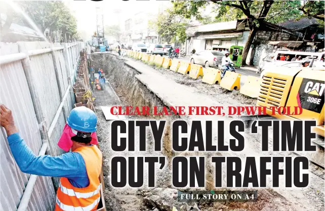  ?? SUNSTAR FOTO/ALEX BADAYOS ?? READY FOR PHASE 2. Workers are ready to move on to the second phase of an ongoing underpass project in Mambaling, Cebu City, but transporta­tion managers want DPWH to clear one lane first, for motorists’ safety.