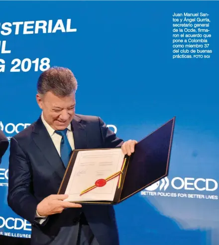  ?? FOTO SGI ?? Juan Manuel Santos y Ángel Gurría, secretario general de la Ocde, firmaron el acuerdo que pone a Colombia como miembro 37 del club de buenas prácticas.