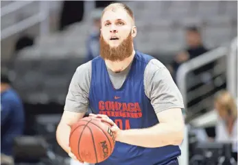  ?? STAN SZETO, USA TODAY SPORTS ?? “I would call it like a trademark maybe,” Gonzaga center Przemek Karnowski says of his beard.