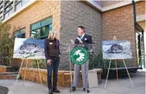  ?? ANA RAMIREZ U-T ?? The San Diego Zoo Wildlife Alliance’s Debra Shier receives a plaque from Michael Empric, an adjudicato­r for Guinness World Records, during an event Wednesday at the Safari Park.