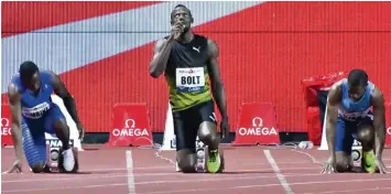  ?? Foto: Norbert Scanella ?? Ein Blick zum Himmel – danach geht die Post ab. Usain Bolt, Weltrekord­halter über 100 und 200 m.