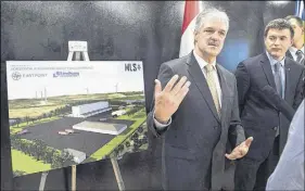  ?? ANDREW VAUGHAN   THE CANADIAN PRESS ?? Stephen Matier, left, president of Maritime Launch Services and Maksym Degtiarov, chief designer of the launch vehicle at the Yuzhnoye Design Bureau, talk with reporters at a meeting of the proposed Canso, Spaceport project team in Dartmouth, in...