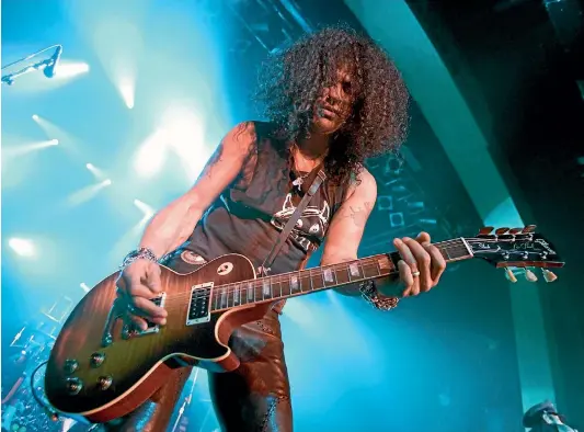  ?? REUTERS ?? US rock act Guns n’ Roses, featuring guitar player Slash, is set to play to shows in New Zealand early next month.
