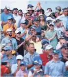  ?? BRANDON DAHLBERG/THE COMMERCIAL APPEAL ?? Fans react to Brooks Koepka’s winning putt on No. 18 on July 28 at the WGC-FEDEX St. Jude Invitation­al. The average economic impact of past Fedex St. Jude Classic competitio­ns was usually about $20 million. Officials expect this year’s WGC event to have double the financial impact on the Memphis area.