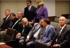  ?? PHOTO BY KURT MILLER ?? The seven defendants in the Beaumont political corruption case, in the front row are Francis Dennis Coe Jr., Joseph Sandy Aklufi, William Kevin Aylward, Ernest Alois Egger, Deepak Moorjani, David Willliam Dillon, and Alan Charles Kapanicas, left to right, in the back row are attorneys James Taylor and Virginia Blumenthal, left to right, prior court proceeding­s in Dept. 52 of Riverside Superior Court in August 2016..