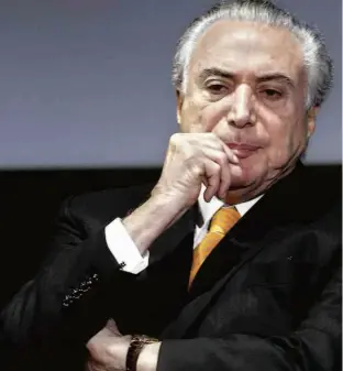  ?? Andre Penner/AP ?? O presidente Michel Temer, no Fórum de Investimen­tos do Brasil, em maio; nota do Planalto acusa empresário de proteger PT e dizer mentiras em entrevista